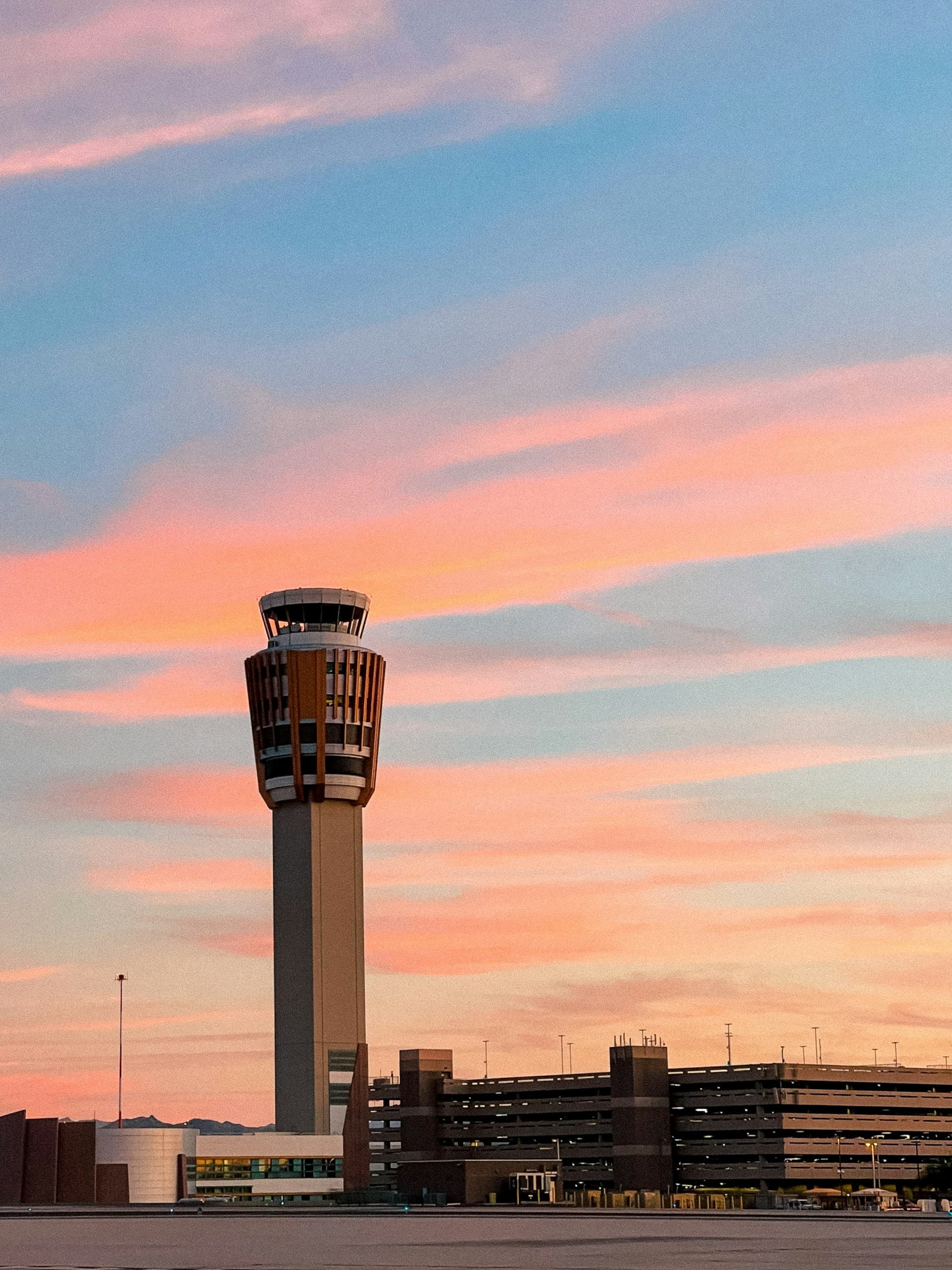 Air traffic control tower at sunset